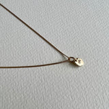formed initial - solid gold