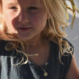 the sun visage pendant - solid gold
