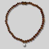 the amber necklace - solid gold