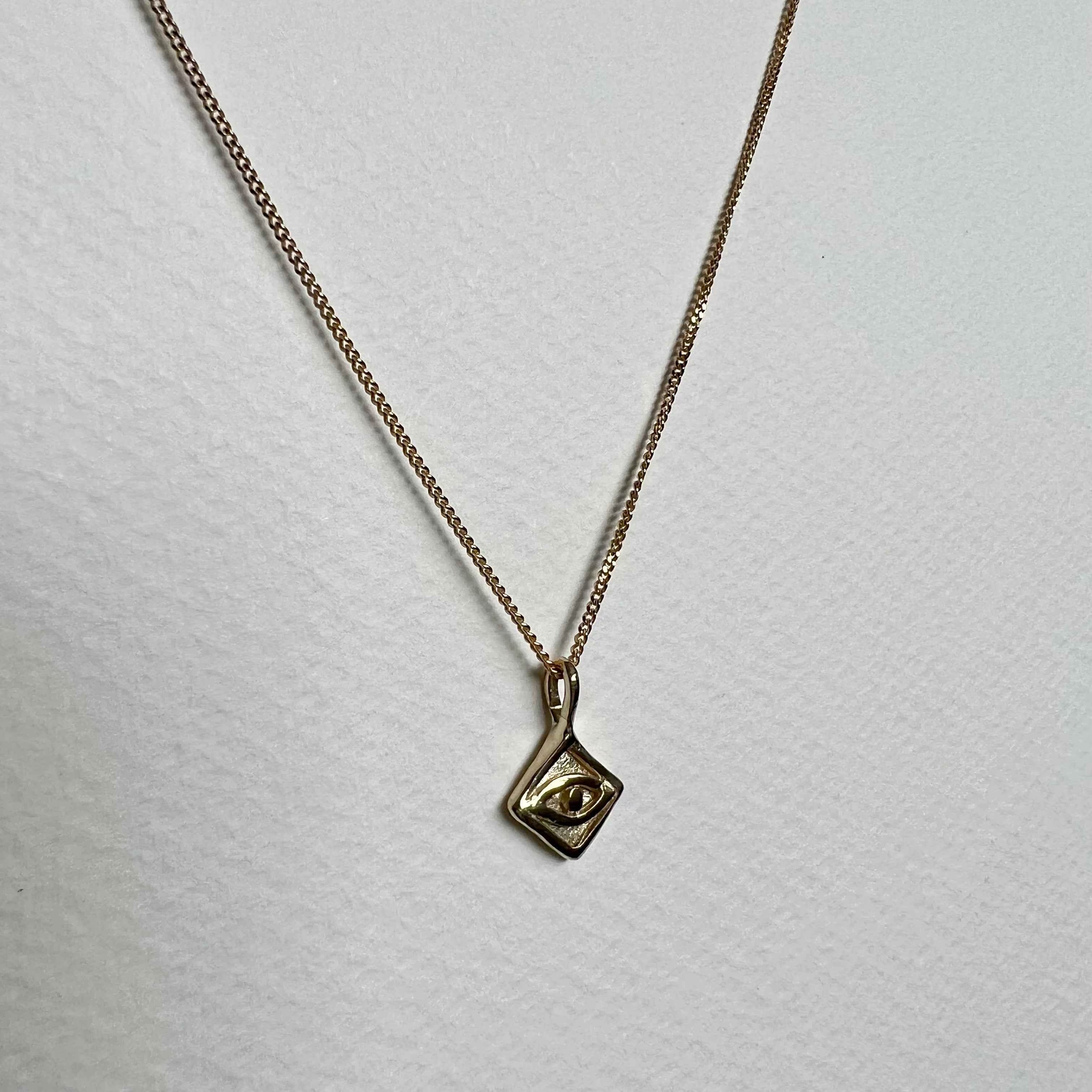 the evil eye pendant - solid gold